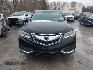 2016 Acura RDX with VIN 5J8TB4H38GL015305, listed as a IAAI auction lot 41672385 with 121,623 mi miles. Bid and sale history available at carsss.com. Image 6.