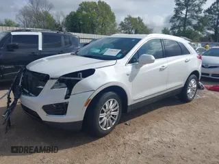 2017 Cadillac XT5 FWD with VIN 1GYKNARS0HZ107734, listed as a IAAI auction lot 41882031 with 89,397 mi miles. Bid and sale history available at carsss.com. Image 18.