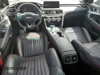 2023 Genesis G70 2.0T with VIN KMTG34TA5PU110175, listed as a Copart auction lot 58297715 with 43,716 mi miles and Salvage title. Bid and sale history available at DreamBid. Image 8.