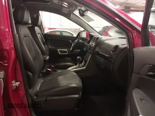 2014 Chevrolet Captiva Sport LT z VIN 3GNAL3EK2ES609279, wystawiony jako IAAI lot #42135344 z przebiegiem 46 330 mil mil oraz . Historia ofert i sprzedaży dostępna na DreamBid. Obrazek 5.