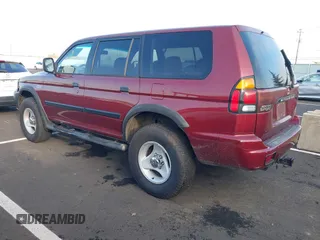 2000 Mitsubishi Montero Sport LS with VIN JA4MT31H5YP808601, listed as a IAAI auction lot 41070635 with 209,172 mi miles. Bid and sale history available at carsss.com. Image 3.