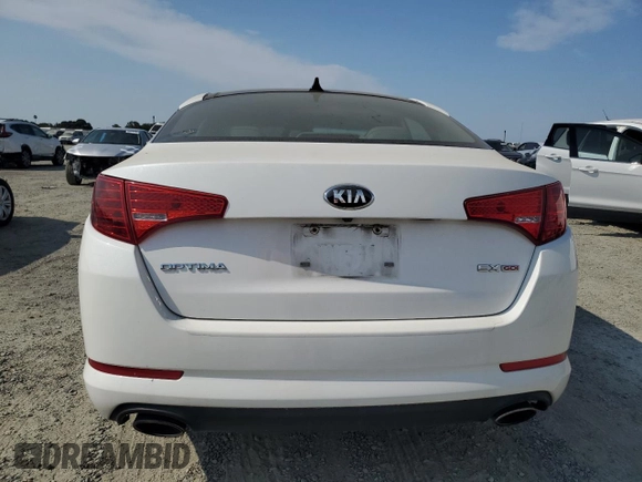 2013 Kia Optima EX с VIN 5XXGN4A73DG124982, выставлен на аукционе Copart как лот 59822095 с пробегом 188 458 миль миль и Чистый • Clean title. История ставок и продаж доступна на DreamBid. Изображение 6.