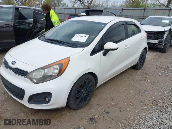 2012 Kia Rio EX with VIN KNADN5A31C6041521, listed as a IAAI auction lot 41994678 with 142,229 mi miles. Bid and sale history available at carsss.com. Image 2.