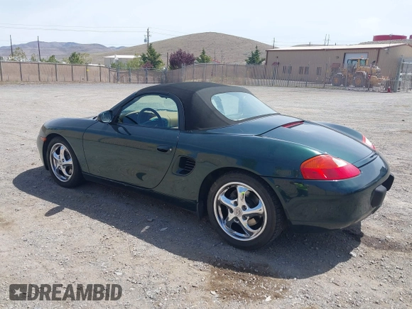 1999 Porsche Boxster with VIN WP0CA2986XU627495, listed as a IAAI auction lot 42112724 with 94,090 mi miles and . Bid and sale history available at DreamBid. Image 3.