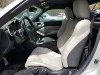 2010 Nissan 370Z with VIN JN1AZ4EH6AM505621, listed as a Copart auction lot 52745505 with 107,660 mi miles and Salvage Title. Bid and sale history available at carsss.com. Image 7.