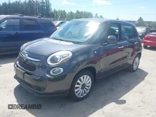 2014 FIAT 500L Easy with VIN ZFBCFABH0EZ028102, listed as a IAAI auction lot 42721149 with 115,137 mi miles and . Bid and sale history available at DreamBid. Image 2.