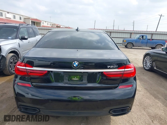 2017 BMW 7 Series 750i with VIN WBA7F0C55HGM21460, listed as a IAAI auction lot 41934198 with 58,206 mi miles and . Bid and sale history available at DreamBid. Image 16.