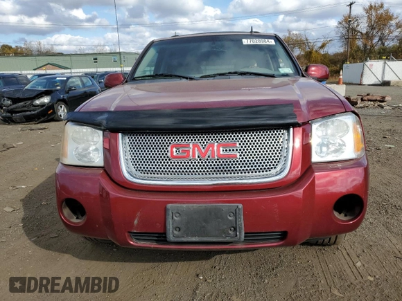 2007 GMC Envoy Denali with VIN 1GKET63M472231291, listed as a Copart auction lot 77020984 with 157,364 mi miles and Salvage Title. Bid and sale history available at DreamBid. Image 5.