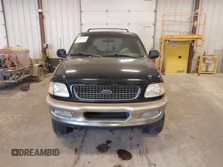 1998 Ford Expedition XLT z VIN 1FMPU18L7WLB32554, wystawiony jako IAAI lot #41888349 z przebiegiem 292 663 mil mil oraz . Historia ofert i sprzedaży dostępna na DreamBid. Obrazek 6.