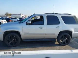 2010 GMC Yukon SLT with VIN 1GKUCCE00AR255901, listed as a IAAI auction lot 42149960 with 196,014 mi miles. Bid and sale history available at carsss.com. Image 14.