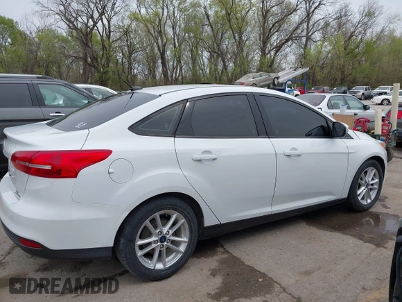 2016 Ford Focus SE with VIN 1FADP3F2XGL324613, listed as a IAAI auction lot 41971597 with 126,738 mi miles. Bid and sale history available at carsss.com. Image 13.