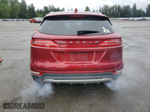 2015 Lincoln MKC z VIN 5LMTJ2AHXFUJ10820, wystawiony jako Copart lot #57139315 z przebiegiem 128 714 mil mil oraz Szkody całkowita. Historia ofert i sprzedaży dostępna na DreamBid. Obrazek 6.
