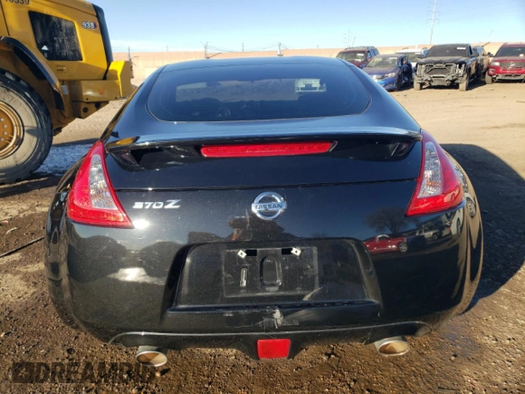2014 Nissan 370Z Nismo z VIN JN1AZ4EHXEM632166, wystawiony jako Copart lot #88311915 z przebiegiem 18 414 mil mil oraz Szkoda całkowita • Salvage title. Historia ofert i sprzedaży dostępna na DreamBid. Obrazek 6.