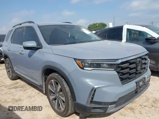 2023 Honda Pilot Touring z VIN 5FNYG2H72PB011136, wystawiony jako IAAI lot #41923691 z przebiegiem 37 291 mil mil oraz . Historia ofert i sprzedaży dostępna na DreamBid. Obrazek 1.