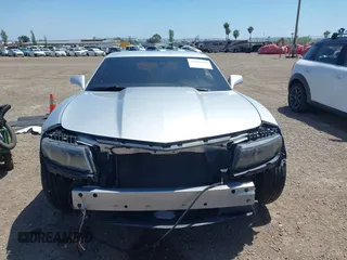2014 Chevrolet Camaro LT z VIN 2G1FG1E30E9207699, wystawiony jako IAAI lot #42256519 z przebiegiem 107 219 mil mil oraz . Historia ofert i sprzedaży dostępna na DreamBid. Obrazek 12.