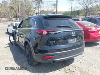2023 Mazda CX-9 Touring Plus with VIN JM3TCBAY9P0657854, listed as a IAAI auction lot 41931409 with 54,036 mi miles and . Bid and sale history available at DreamBid. Image 14.