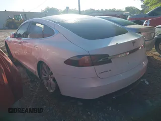 2016 Tesla Model S 90D with VIN 5YJSA1E21GF128460, listed as a IAAI auction lot 40733920 with 89,846 mi miles and . Bid and sale history available at DreamBid. Image 3.