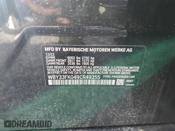 2024 BMW i5 eDrive40 with VIN WBY33FK04RCR49355, listed as a Copart auction lot 55828475 with Not Provided miles and Salvage Title. Bid and sale history available at DreamBid. Image 12.