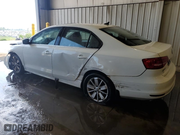2015 Volkswagen Jetta SE with VIN 3VWD17AJ5FM256703, listed as a Copart auction lot 62699375 with 130,247 mi miles and Salvage title. Bid and sale history available at DreamBid. Image 2.