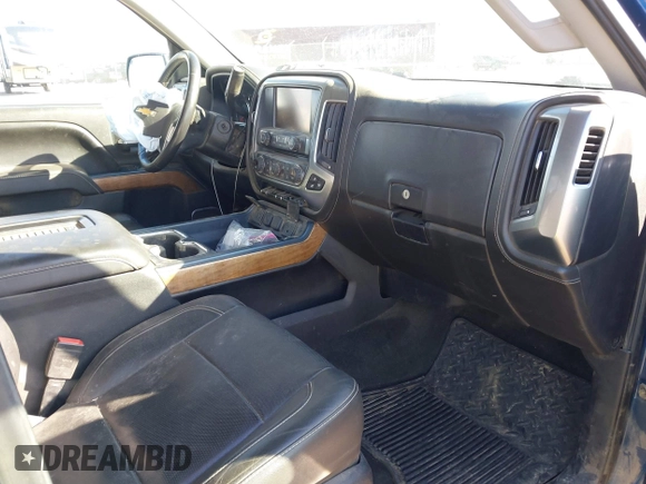 2017 Chevrolet Silverado 1500 LTZ with VIN 3GCUKSEC4HG371972, listed as a IAAI auction lot 41696294 with 123,297 mi miles and . Bid and sale history available at DreamBid. Image 5.