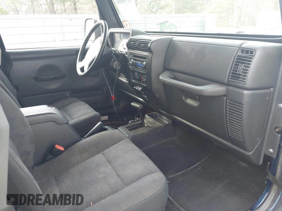 2005 Jeep Wrangler Sport z VIN 1J4FA49S25P302627, wystawiony jako IAAI lot #42100601 z przebiegiem 169 650 mil mil oraz . Historia ofert i sprzedaży dostępna na DreamBid. Obrazek 5.