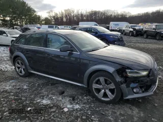 2014 Audi allroad Premium with VIN WA1TFAFL0EA146350, listed as a Copart auction lot 87626145 with 107,462 mi miles and Salvage Title. Bid and sale history available at carsss.com. Image 4.