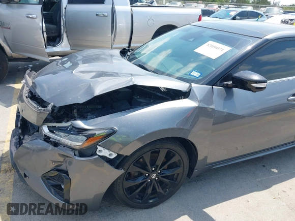 2020 Nissan Maxima SR with VIN 1N4AA6EVXLC383592, listed as a IAAI auction lot 42058071 with 103,014 mi miles and . Bid and sale history available at DreamBid. Image 17.