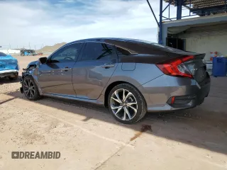 2021 Honda Civic Sport with VIN 19XFC2F80ME003634, listed as a Copart auction lot 52317715 with 69,411 mi miles and Salvage Title. Bid and sale history available at DreamBid. Image 2.
