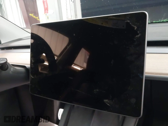 2023 Tesla Model Y Performance with VIN 7SAYGDEF5PF665560, listed as a IAAI auction lot 41809349 with Not Provided miles and . Bid and sale history available at DreamBid. Image 7.