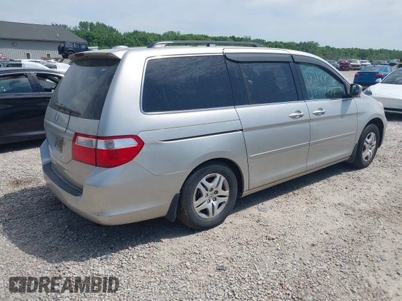 2007 Honda Odyssey EX-L z VIN 5FNRL38797B042602, wystawiony jako IAAI lot #42300656 z przebiegiem 250 000 mil mil oraz . Historia ofert i sprzedaży dostępna na DreamBid. Obrazek 4.