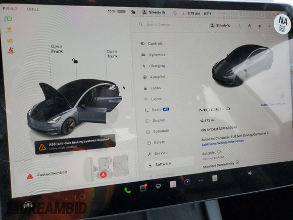 2023 Tesla Model 3 with VIN 5YJ3E1EA3PF697049, listed as a Copart auction lot 55601295 with 12,373 mi miles and Salvage Title. Bid and sale history available at DreamBid. Image 9.