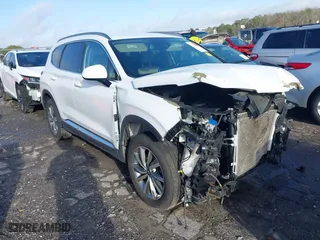 2019 Hyundai Santa Fe SEL with VIN 5NMS33AD1KH045518, listed as a IAAI auction lot 41719014 with 73,477 mi miles. Bid and sale history available at carsss.com. Image 1.