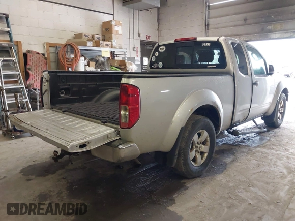 2009 Nissan Frontier SE with VIN 1N6AD06W29C407072, listed as a IAAI auction lot 42331293 with 220,635 mi miles and . Bid and sale history available at DreamBid. Image 4.