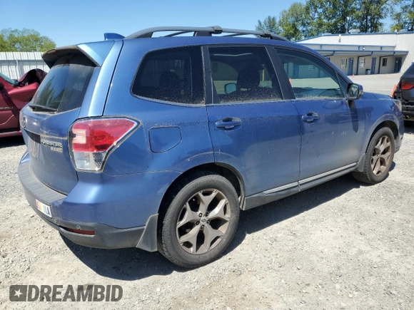 2017 Subaru Forester Touring with VIN JF2SJAWC2HH429099, listed as a Copart auction lot 64671135 with 104,709 mi miles and Salvage title. Bid and sale history available at DreamBid. Image 3.