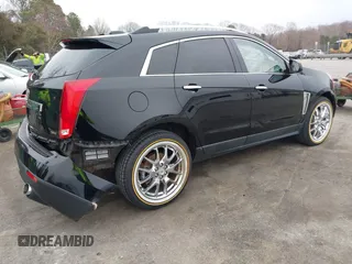 2016 Cadillac SRX Luxury Collection with VIN 3GYFNEE3XGS525706, listed as a IAAI auction lot 41744652 with 98,133 mi miles. Bid and sale history available at carsss.com. Image 4.