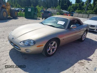 2002 Jaguar XK with VIN SAJDA42C32NA24378, listed as a IAAI auction lot 42205854 with 92,612 mi miles and . Bid and sale history available at DreamBid. Image 2.