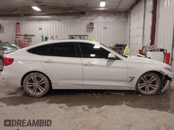 2016 BMW 3 Series GT 328i xDrive with VIN WBA8Z5C54GG500965, listed as a IAAI auction lot 41254000 with 115,672 mi miles. Bid and sale history available at carsss.com. Image 13.