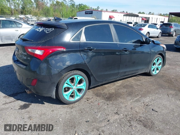 2014 Hyundai Elantra GT with VIN KMHD35LH5EU171569, listed as a IAAI auction lot 41882896 with 181,989 mi miles. Bid and sale history available at carsss.com. Image 4.