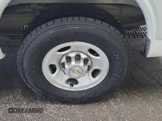 2012 Chevrolet Express Cargo with VIN 1GCWGFCA8C1179156, listed as a IAAI auction lot 42667299 with 168,910 mi miles and . Bid and sale history available at DreamBid. Image 35.