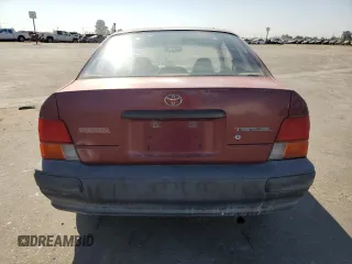 1996 Toyota Tercel DX z VIN JT2AC52L8T0124403, wystawiony jako Copart lot #66195834 z przebiegiem 137 467 mil mil oraz Szkody całkowita. Historia ofert i sprzedaży dostępna na DreamBid. Obrazek 6.