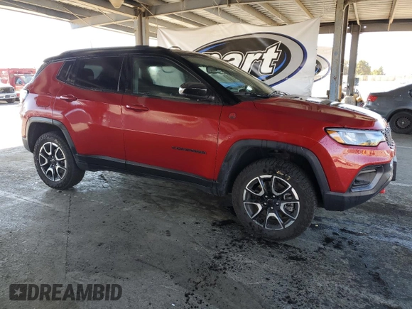 2025 Jeep Compass Trailhawk with VIN 3C4NJDDNXST553759, listed as a Copart auction lot 64247685 with 9,314 mi miles and Salvage title. Bid and sale history available at DreamBid. Image 4.