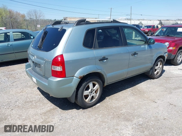 2007 Hyundai Tucson GLS with VIN KM8JM12B27U648659, listed as a IAAI auction lot 41975422 with 248,625 mi miles. Bid and sale history available at carsss.com. Image 4.