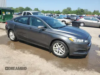 2015 Ford Fusion SE with VIN 3FA6P0HD6FR272418, listed as a Copart auction lot 60294105 with 128,916 mi miles and Salvage title. Bid and sale history available at DreamBid. Image 4.