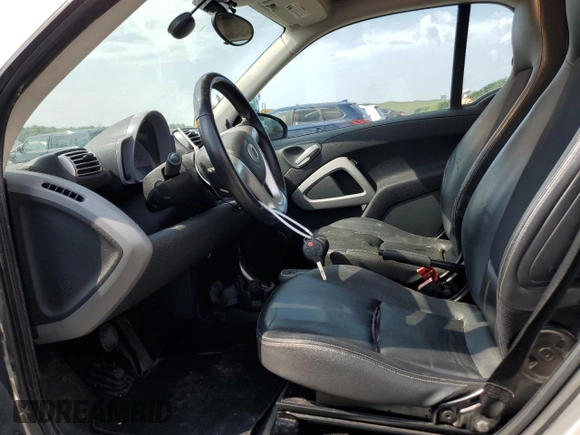 2008 Smart fortwo Pure z VIN WMEEJ31X78K205574, wystawiony jako Copart lot #67711894 z przebiegiem Nie podano mil oraz Tytuł czysty. Historia ofert i sprzedaży dostępna na DreamBid. Obrazek 7.