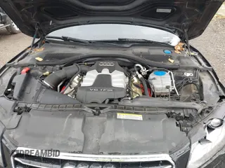 2012 Audi A7 Premium Plus with VIN WAUYGAFC0CN096027, listed as a IAAI auction lot 40881391 with 155,433 mi miles and . Bid and sale history available at DreamBid. Image 10.