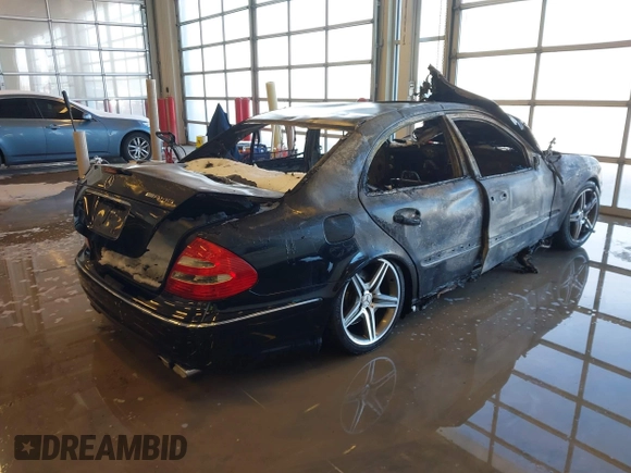 2003 Mercedes-Benz E-Class 5.5L AMG with VIN WDBUF76J73A327193, listed as a IAAI auction lot 41282703 with 1 mi miles. Bid and sale history available at carsss.com. Image 4.