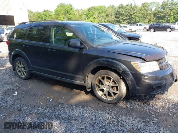 2013 Dodge Journey R/T with VIN 3C4PDDEG4DT691056, listed as a IAAI auction lot 42535196 with 198,307 mi miles and . Bid and sale history available at DreamBid. Image 1.