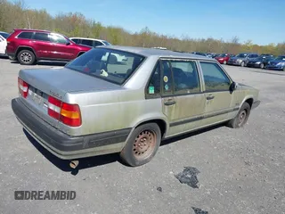 1991 Volvo 900 z VIN YV1JA8942M3020643, wystawiony jako IAAI lot #42130496 z przebiegiem 57 529 mil mil oraz . Historia ofert i sprzedaży dostępna na DreamBid. Obrazek 4.