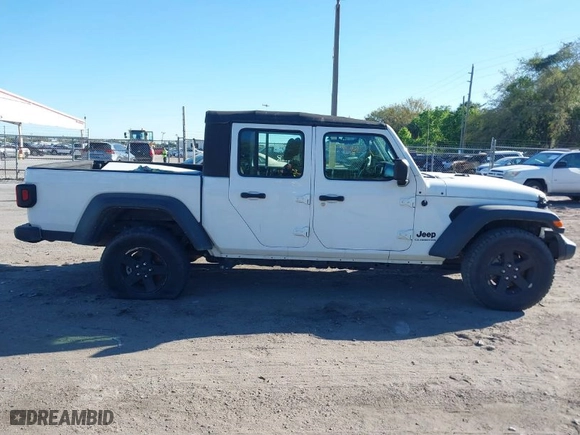 2021 Jeep Gladiator Willys with VIN 1C6HJTAG1ML619781, listed as a IAAI auction lot 41738452 with 62,400 mi miles. Bid and sale history available at carsss.com. Image 13.