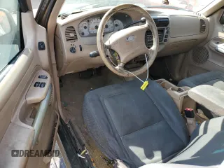 2002 Ford Explorer Sport Value z VIN 1FMYU60E62UB91081, wystawiony jako Copart lot #75688824 z przebiegiem 229 382 mil mil oraz Szkody całkowita. Historia ofert i sprzedaży dostępna na DreamBid. Obrazek 8.
